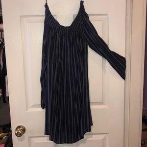 Long sleeve off the shoulder dress.